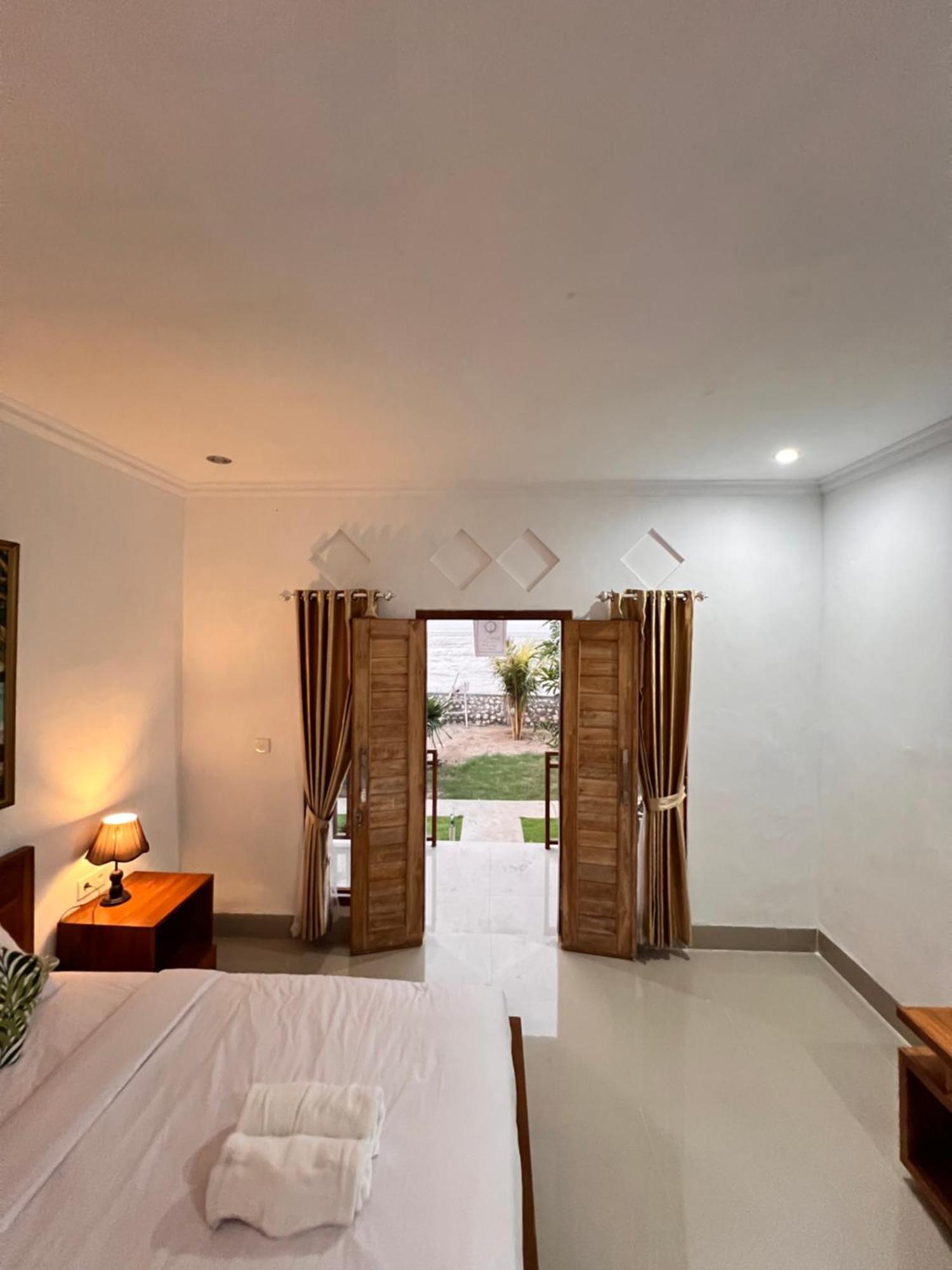 Penyon Beach House Ped Bagian luar foto